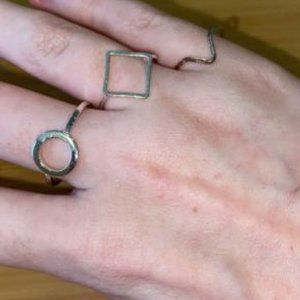 Three Silver Rings in different shapes and sizes